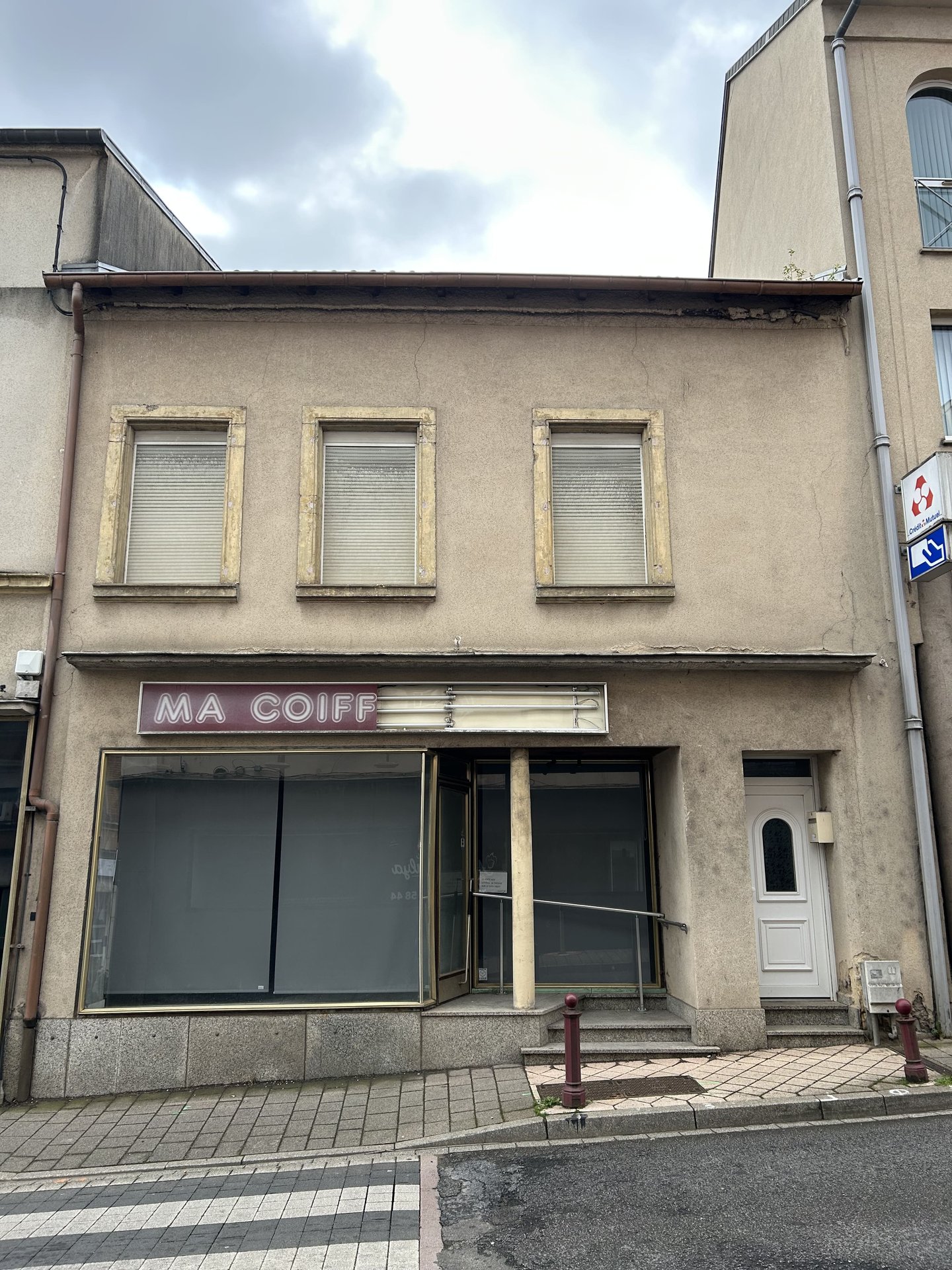 Façade avant rénovation — ancienne boutique Algrange Clémenceau